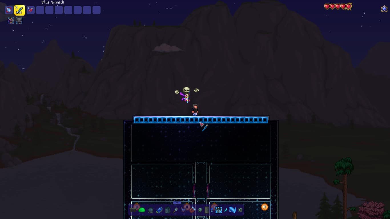 The player using a Wrench to place the last Wire in Terraria