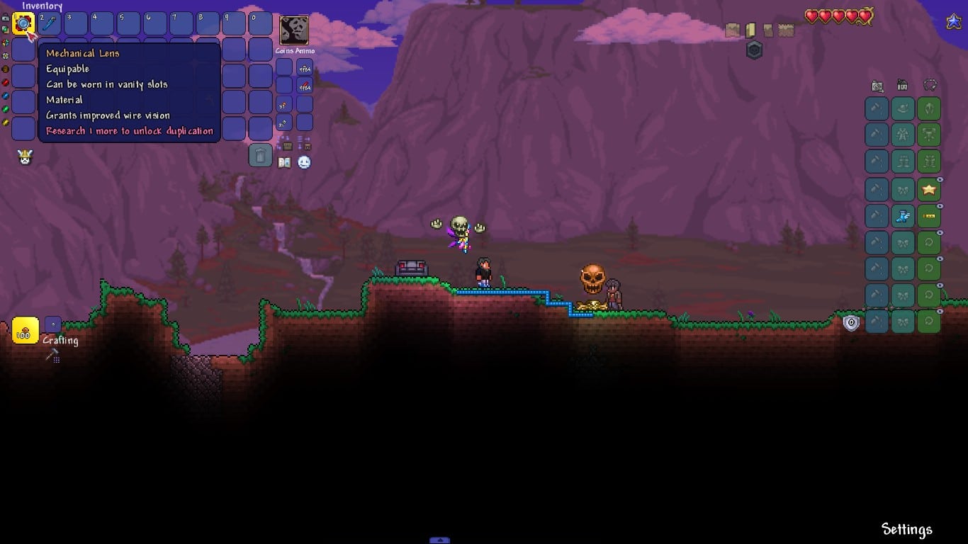 The player using the Mechanical Lens even if it's in the inventory in Terraria.
