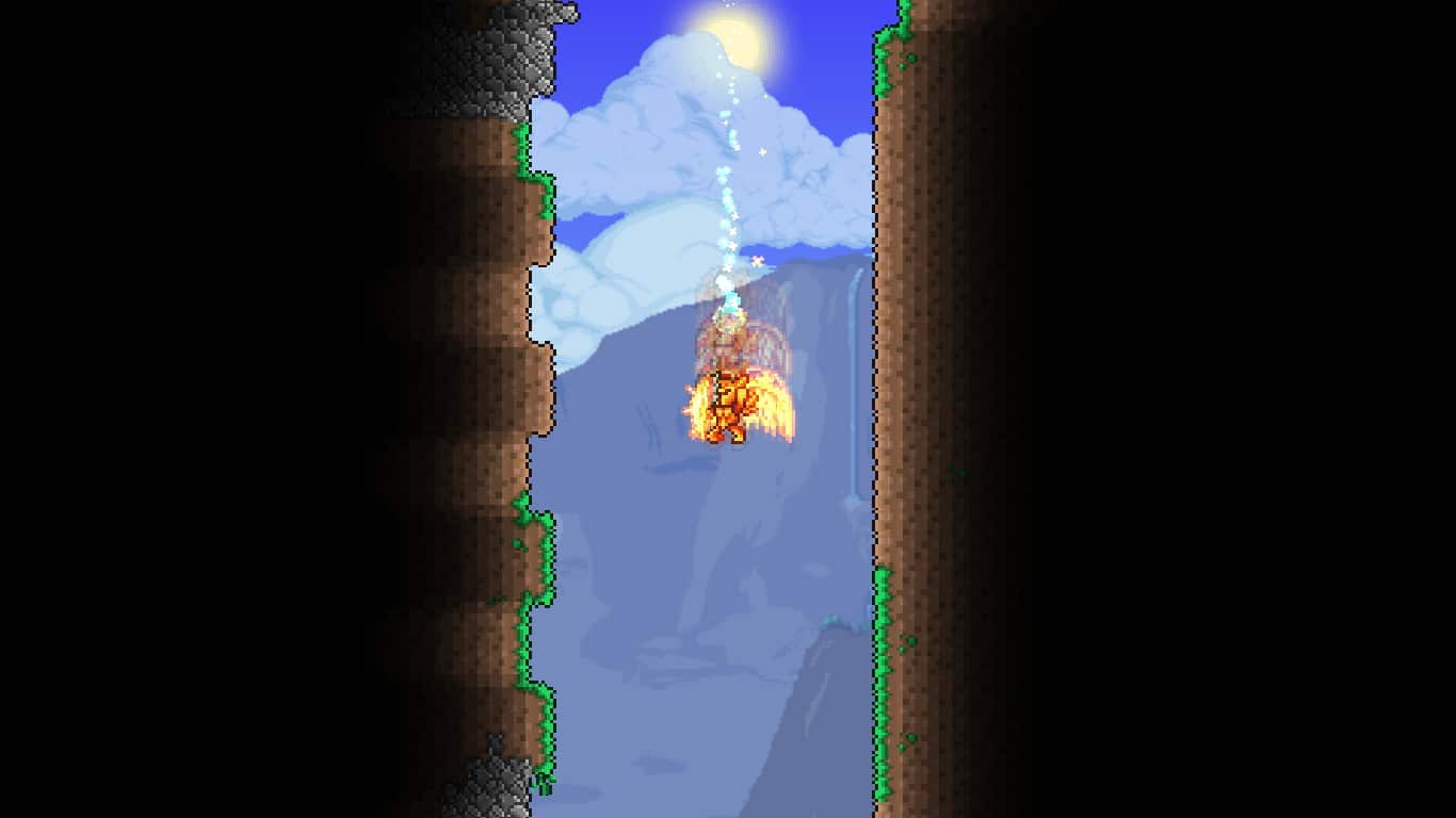The player descending below a pitfall of blocks in Terraria.