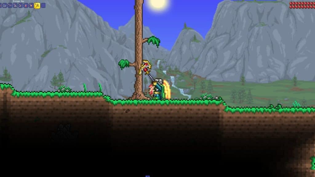 The player using the Pickaxe Axe to chop wood in Terraria.