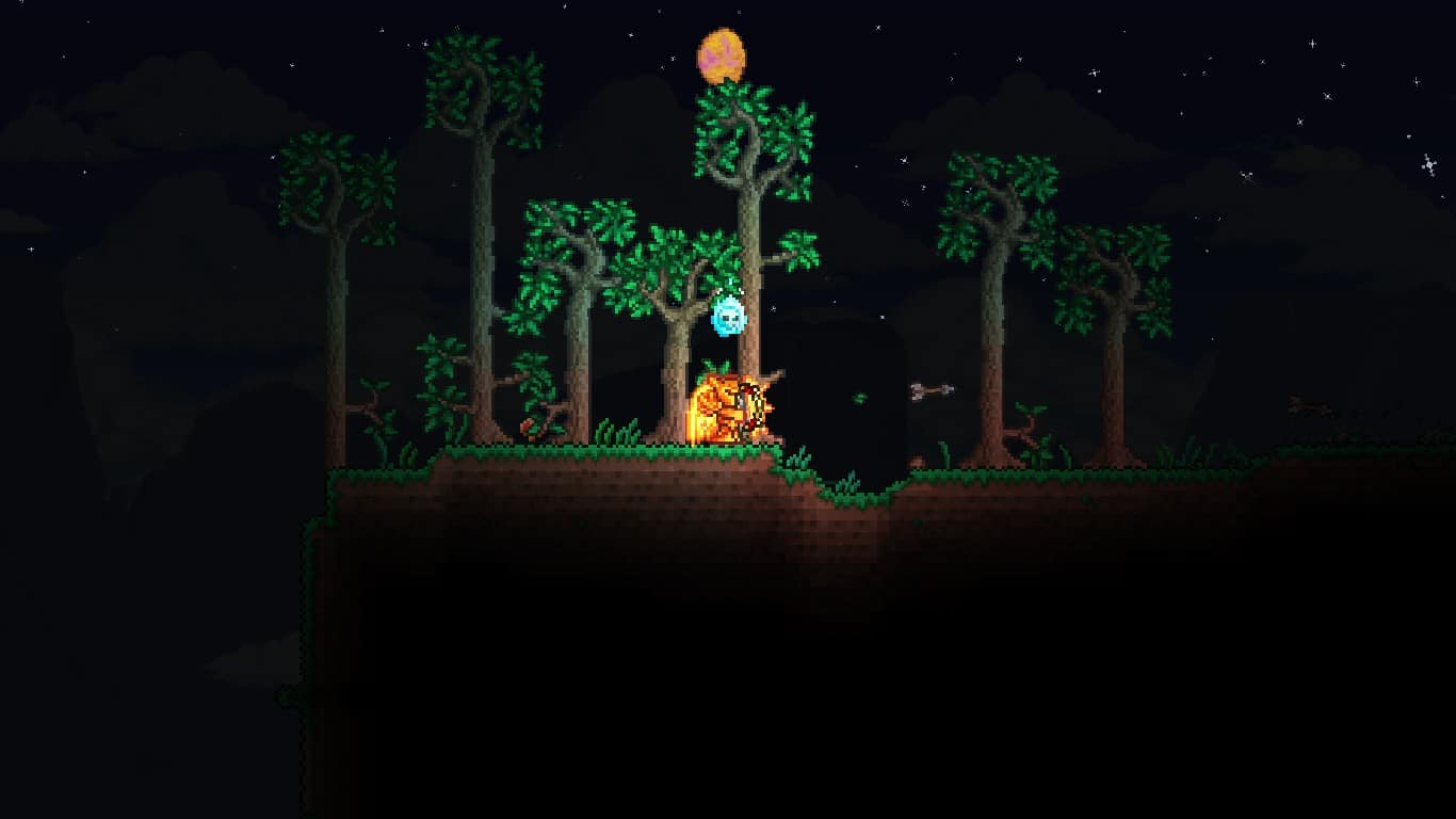 The player using a Bow with Wooden Arrow at night in Terraria.