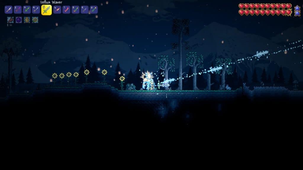 The player using the Influx Waver in Terraria.