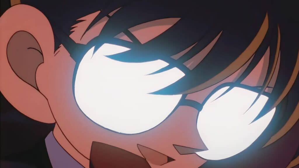 Detective Conan with his signature move (one of the best 90s anime).